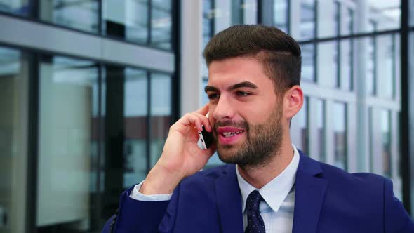 Businessman talking on mobile phone