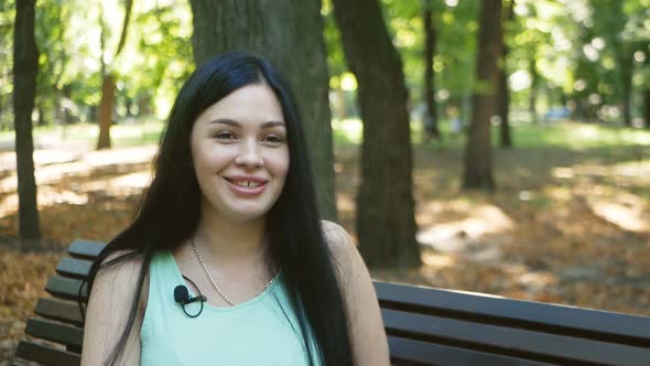 Interview with a Beautiful Girl in the Park for a Blog