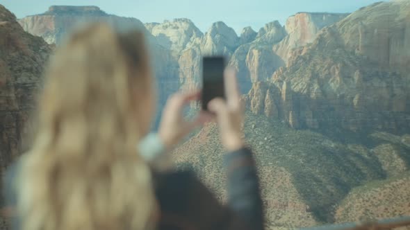 Girl Taking Photo in Zion Park