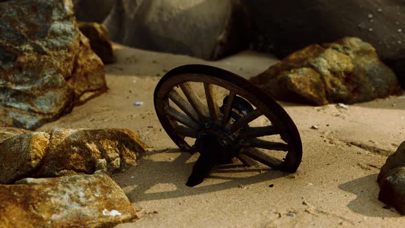 Old Wooden Cart Wheel at Sand Beach