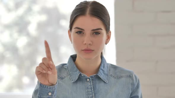 No Young Girl Rejecting Offer By Waving Finger