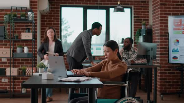 Female Colleagues Analyzing Business Charts on Documents