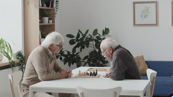 Senior Men Playing Chess