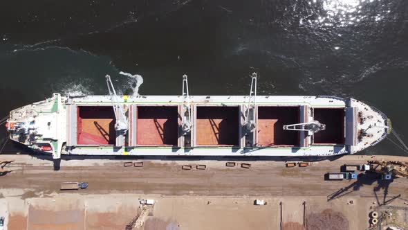 Container cargo freighter ship at landmark Rio de Janeiro harbor.