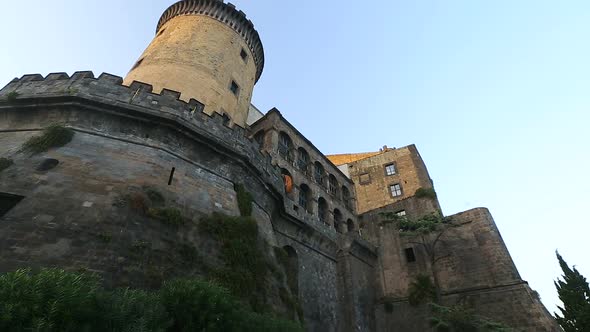 Ancient facade of Maschio Angioino castle in Naples, architecture, heritage