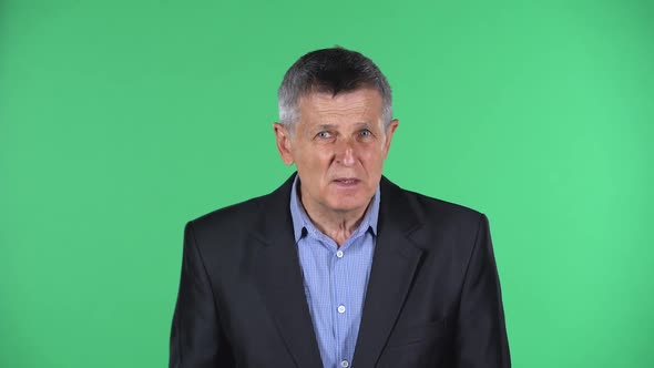 Portrait of Aged Man Looking at the Camera with Excitement, Then Celebrating Victory Triumph