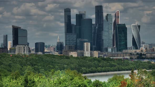 Skyscrapers on Against Cloudy Sky Time Lapse