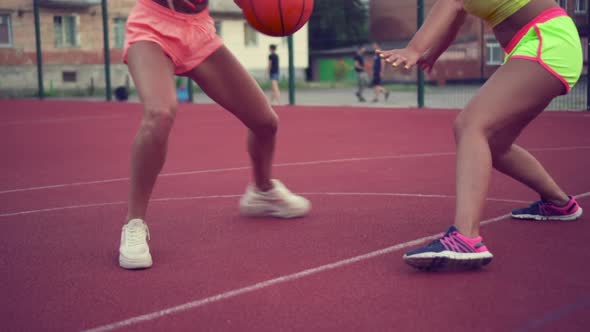 A Group of Women are Playing Basketball