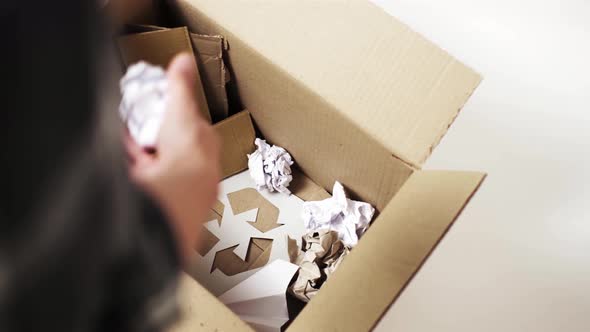 Throwing Paper Waste Into A Special Box For Sorting Recyclable Material Product, Reusing Paper