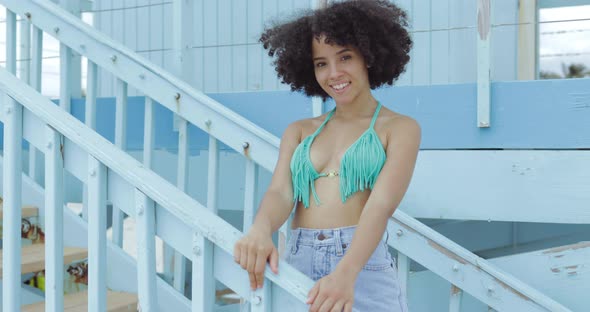 Fit Black Girl in Swimsuit on Resort