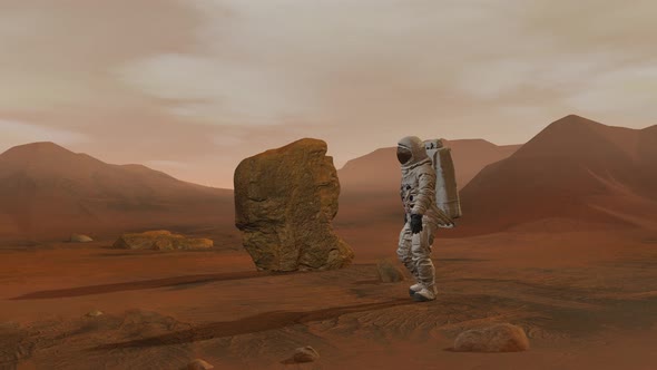 Astronaut Walking On The Surface Of Mars alt