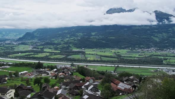 Scenic Panorama of Vaduz Valley By the River Rhine Liechtenstein Alps Mountains