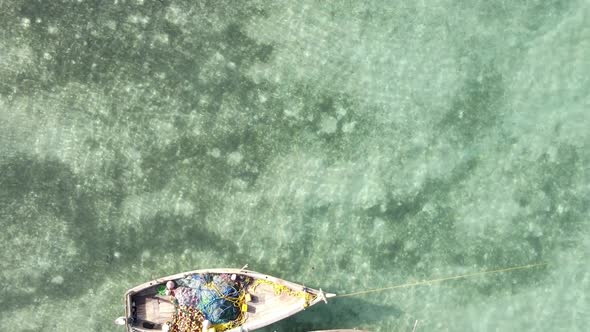 Tanzania Vertical Video  Boat Boats in the Ocean Near the Coast of Zanzibar Aerial View