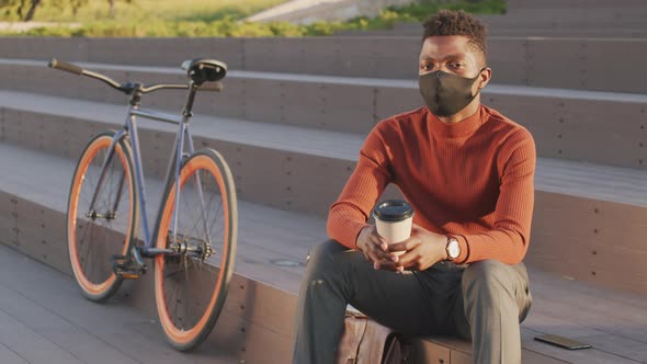 Portrait of African American Businessman in Face Mask Outdoors