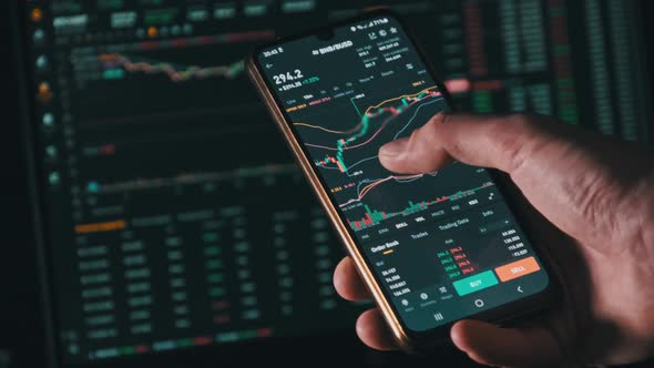Investor Checking Cryptocurrency Price on Smartphone Screen Growth Crypto