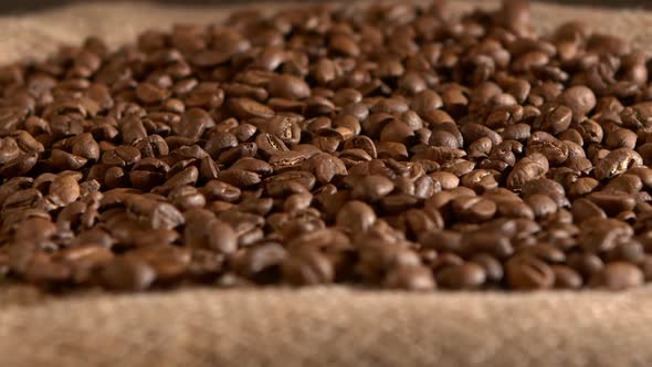 Coffee Beans on Burlap Sacking Background, Rotation