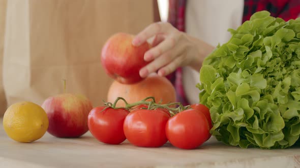 Close Up Female Hands Takes Purchases Refresh Nutriment Products in Bags From Grocery Ecological