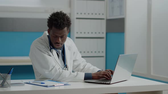 Young Person Working As Doctor in Medical Office