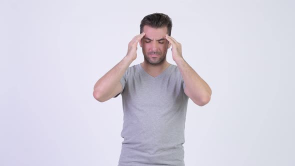 Young Stressed Hispanic Man Having Headache