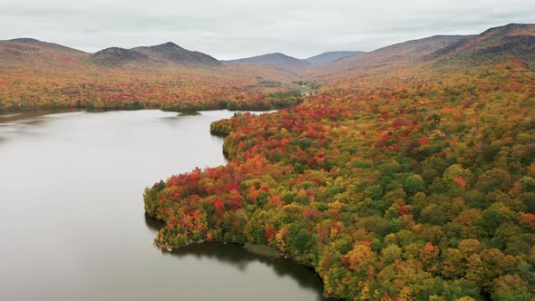 Cinematic Lake with Clouds Reflection in Water Surface Beautiful Fall Landscape