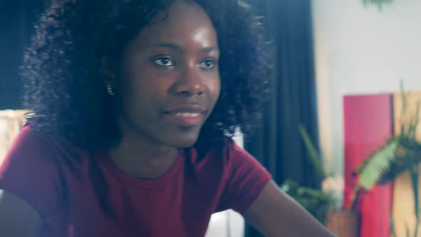 Face of a Young African Woman During Cycling Training