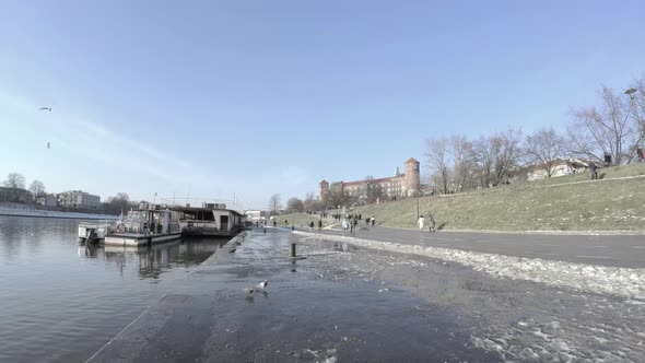 Famous landmark next to river in polish cracow city against famous wawel castle, Central Europe