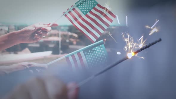 Patriotic Womand and Child Waving the National Flag and a Sparkler in Slow Motion