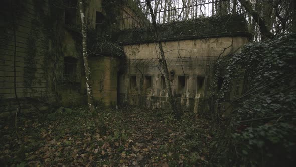 Abandoned hospital in middle of the forest which is part of military fortification's zone.