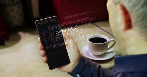 News titles on smartphone screen in hand with cyber attack