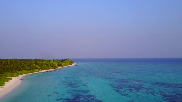 Aerial nature of island beach time by blue ocean with sand background