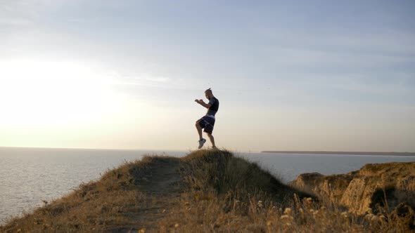 Outdoor Sports, Strong Fighter Men Perform Boxer Strikes Before Contest on Workout on Hill on Nature