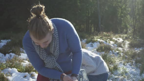 Young people playing with snow