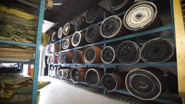 Inventory hallway in a manufacturing warehouse.