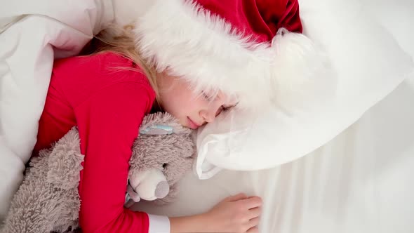 Top View Child Sleeping Before Christmas