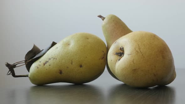 Pears on the table slow tilt   4K 2160p UltraHD footage - Background with fruit from genus Pyrus 384