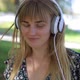 Woman Blonde Listening Music with Headphones - VideoHive Item for Sale