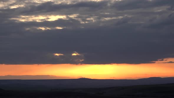 Sun Behind Clouds Before Sunset