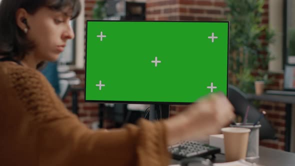 Close Up of Employee Using Computer with Green Screen