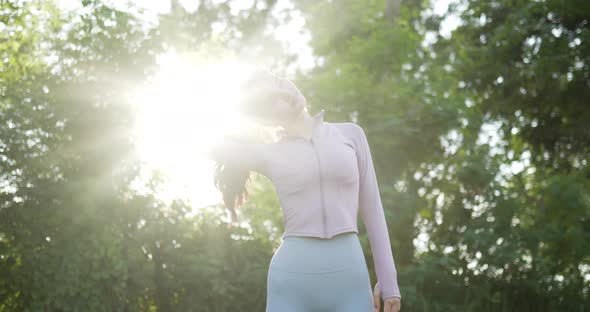 Woman warm up in the garden