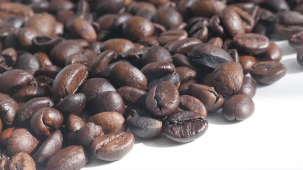 Roasted coffee beans background 4K panning footage