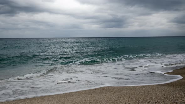 Stormy sea with big waves at stormy rainy day