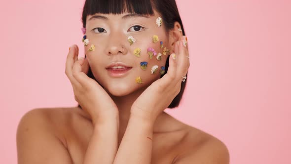 A beautiful asian woman looking to the camera