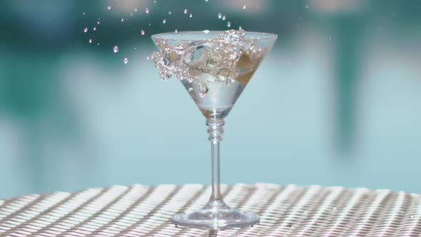 Olive Falls And Splash Into Martini.