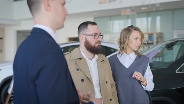 Sales Manager in a Car Dealership Serves a Married Couple