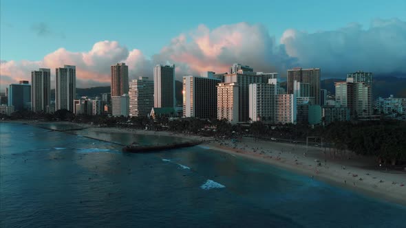 Aerial drone footage of Honolulu, Hawaii. Beautiful real estate, buildings in the city. Palm trees