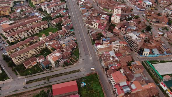 4k daytime aerial drone footage over Avenida Collasuyo and Zoologico UNSAAC in Cusco, Peru during Co