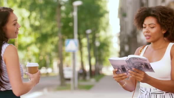 Tourist Women Ask Passerby for Direction in City 43