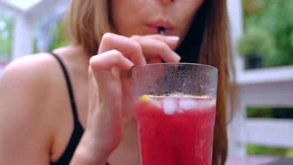 Woman Sitting In Terrace Drink Cold Cocktail