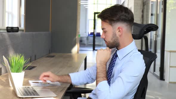 Serious businessman working check corporate business paper correspondence sitting on the desk