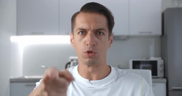 Angry Man Scolding and Shouting at Employees Threatening with a Finger and Shouting Aggressively at